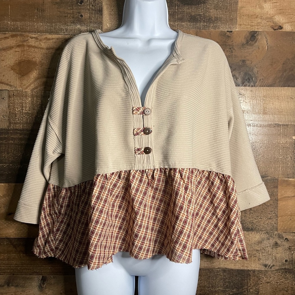 Hem and Thread Babydoll top. New with tags.